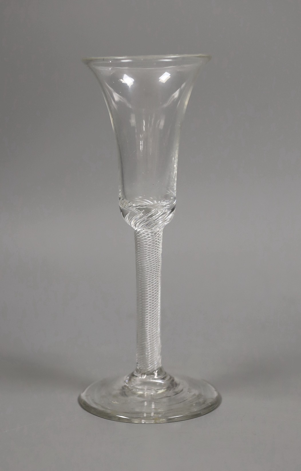 An 18th century air twist ale glass, 18cm tall
